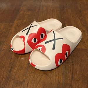 Comme des Garçons PLAY Slides